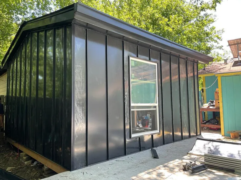 Black standing seam metal wall panels for Metal Roof Installation in Oakdale